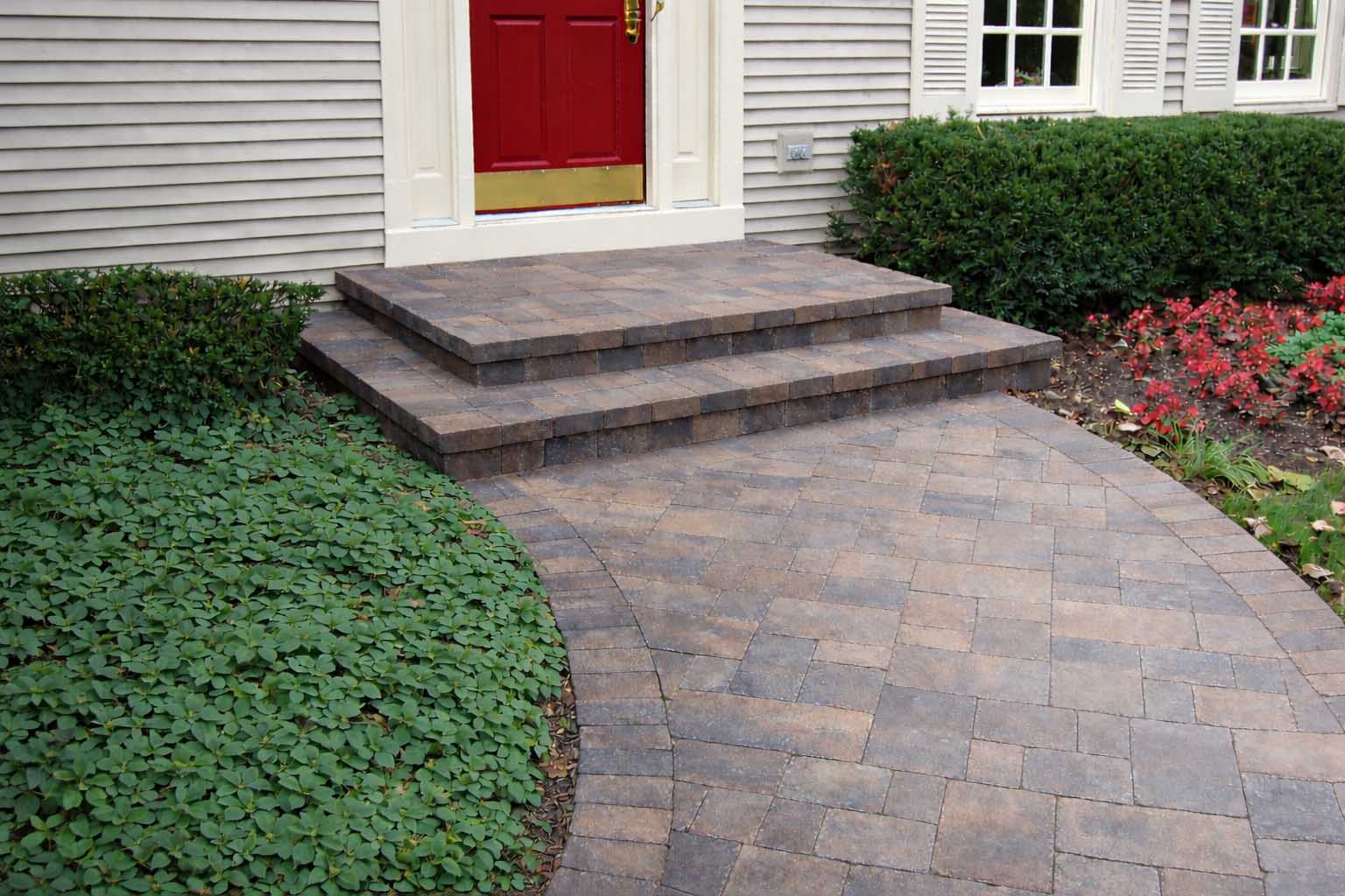 Brick walkway to a brick porch