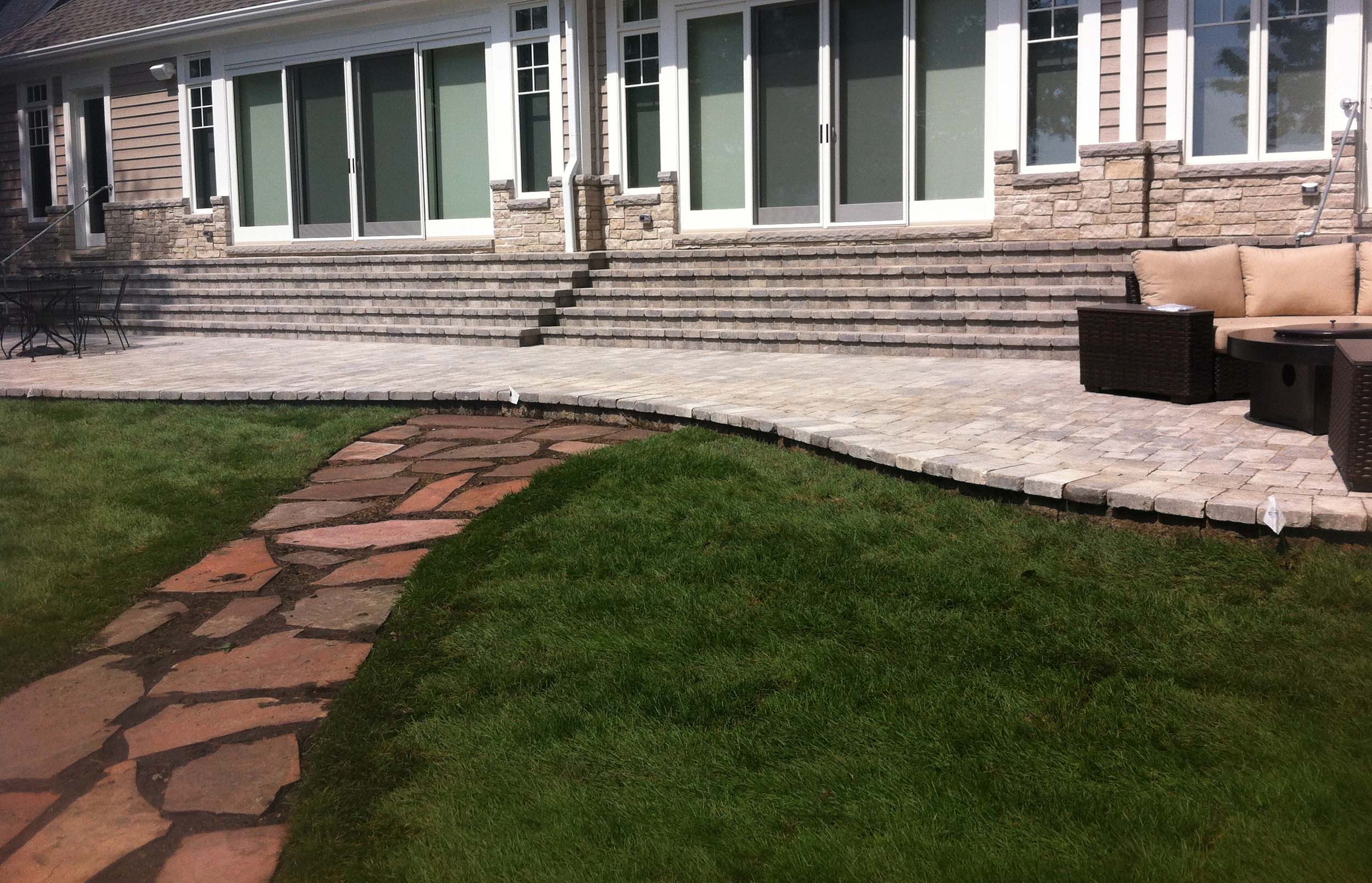 Stone walkway to the patio